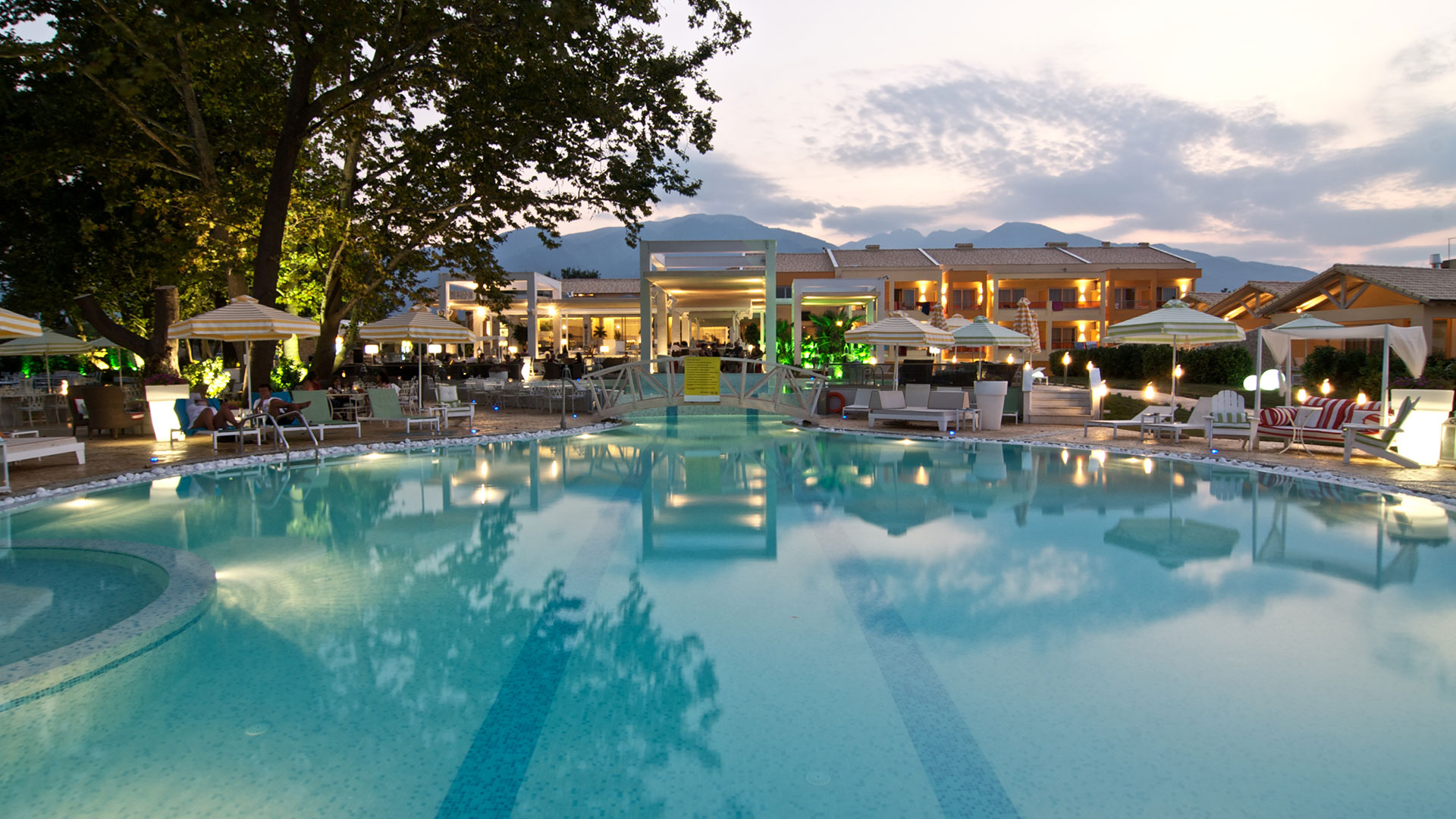 Pool at night with Olympus view