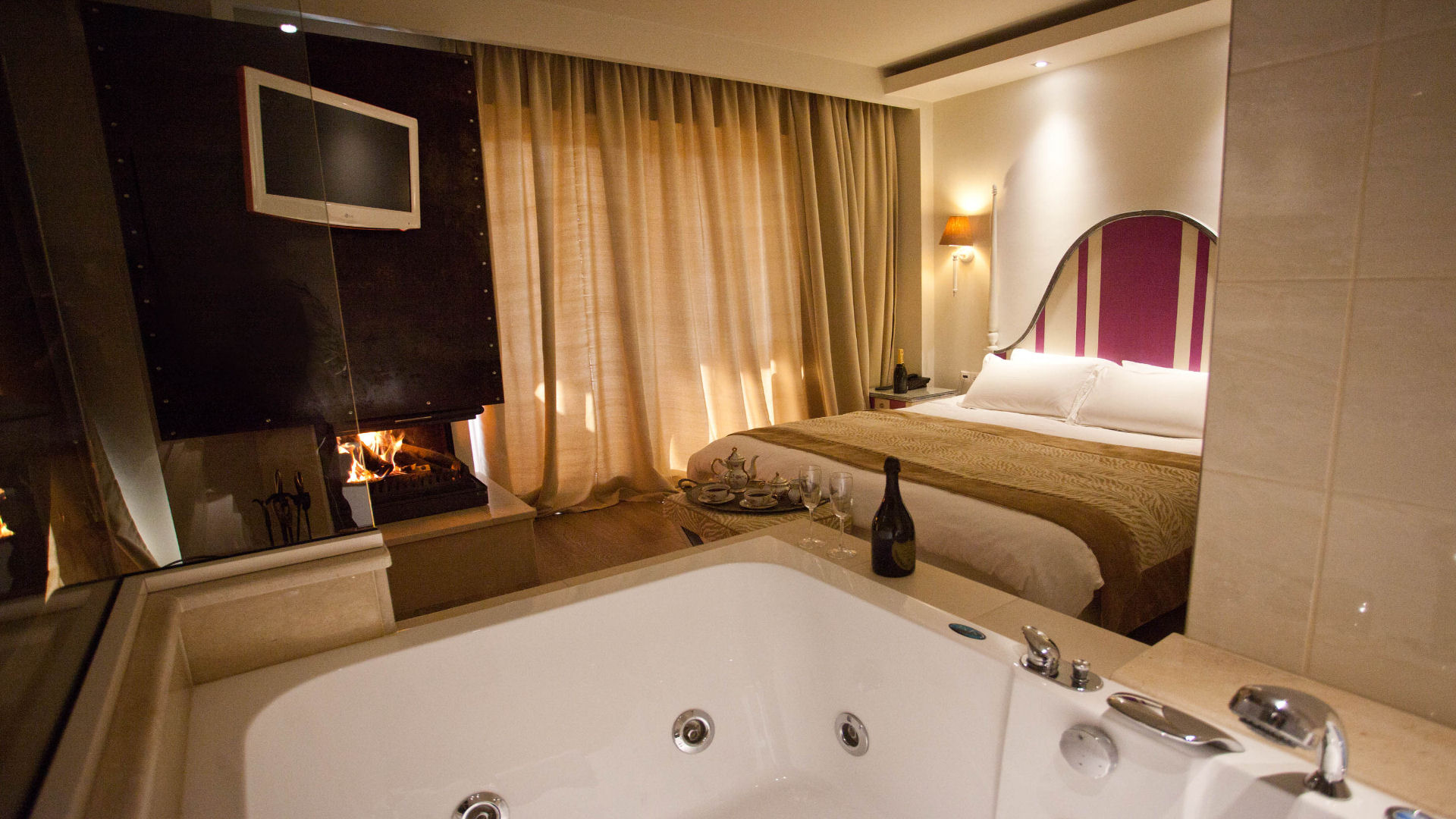 Jacuzzi suite with fireplace